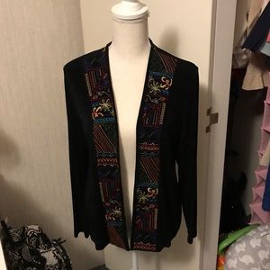 Chico’s colorful cardigan.